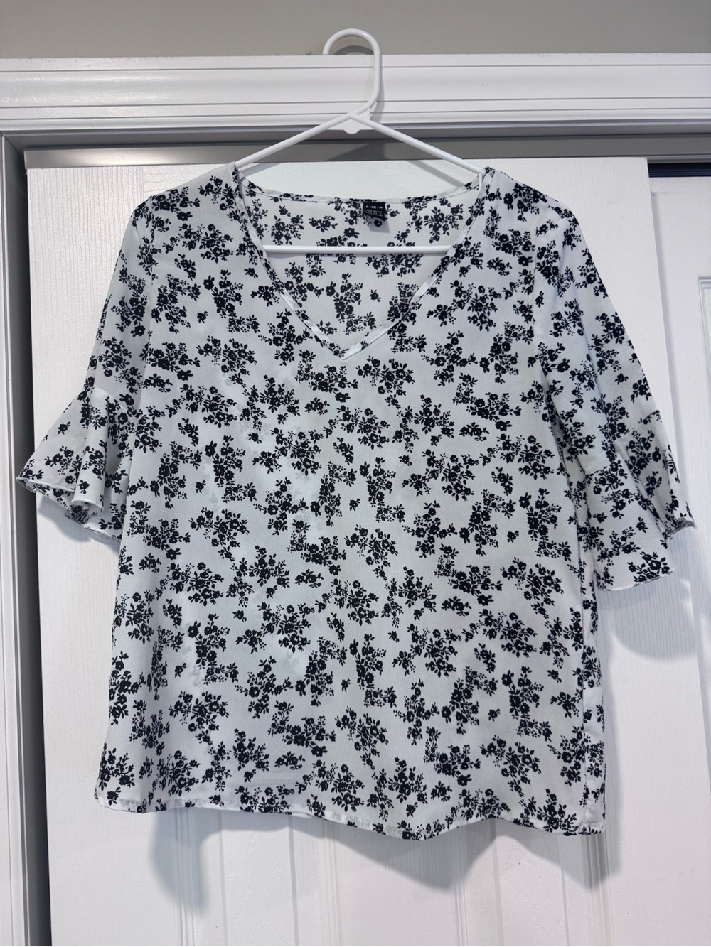 SHEIN Black Floral V-Neck Blouse on White